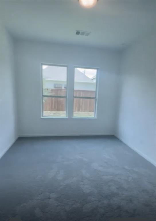 3121 Winecup Way Little Elm, TX 75068 - Photo 20 of 23 an empty room with a window