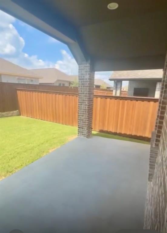 3121 Winecup Way Little Elm, TX 75068 - Photo 21 of 23 a view of an empty room with a window