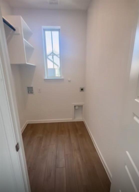 3121 Winecup Way Little Elm, TX 75068 - Photo 5 of 23 a view of a small space with wooden floor and a window