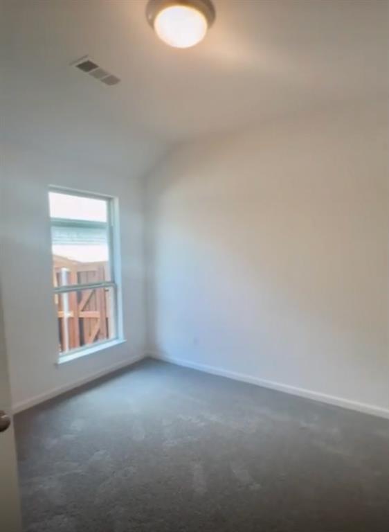 3121 Winecup Way Little Elm, TX 75068 - Photo 9 of 23 an empty room with a window