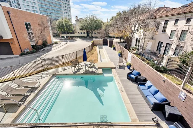 a view of roof deck with patio