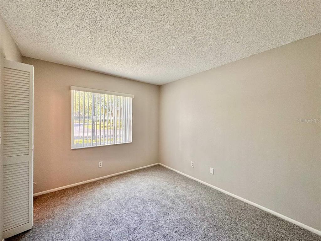 2826 Rampart Circle Clearwater, FL 33761 - Photo 13 of 30 an empty room with a window