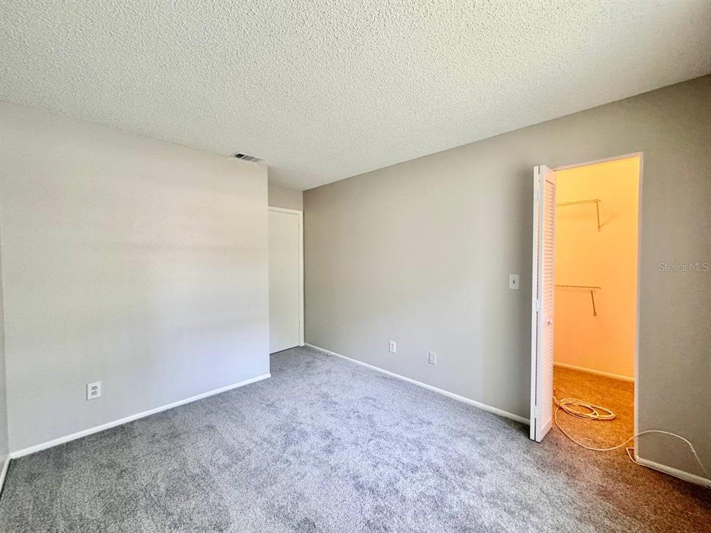 2826 Rampart Circle Clearwater, FL 33761 - Photo 14 of 30 an empty room with windows