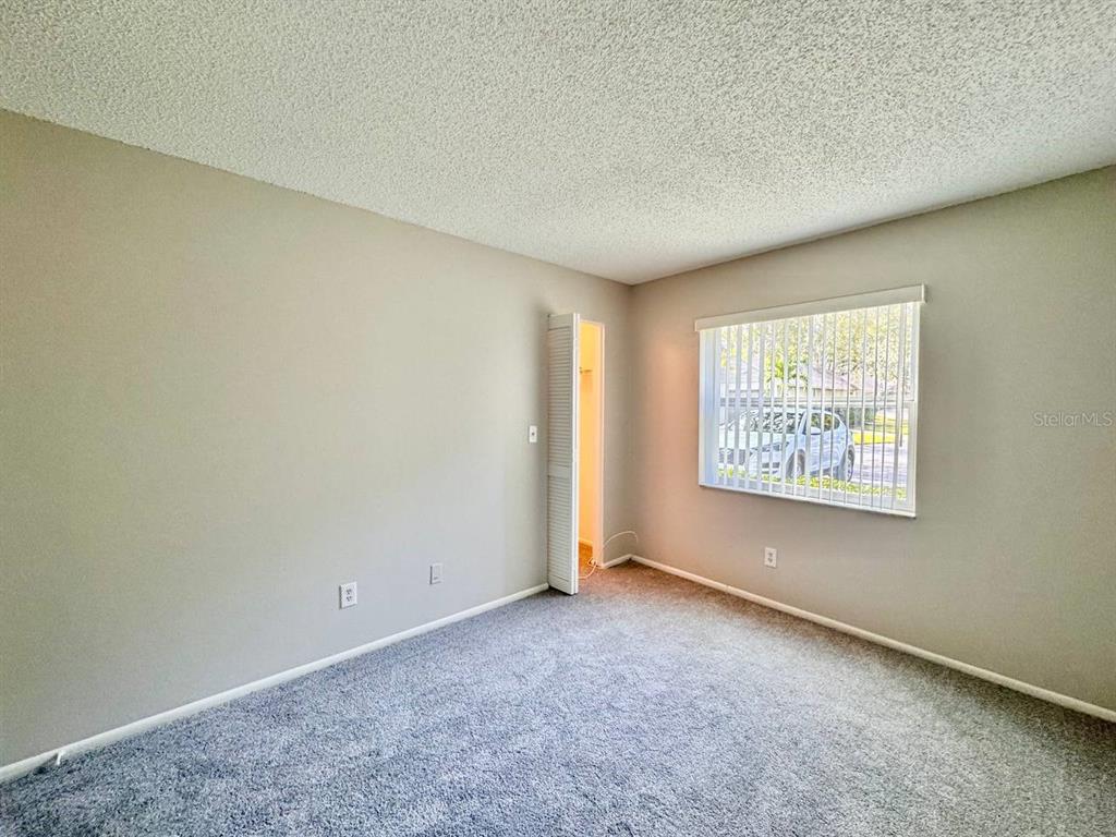 2826 Rampart Circle Clearwater, FL 33761 - Photo 15 of 30 an empty room with windows