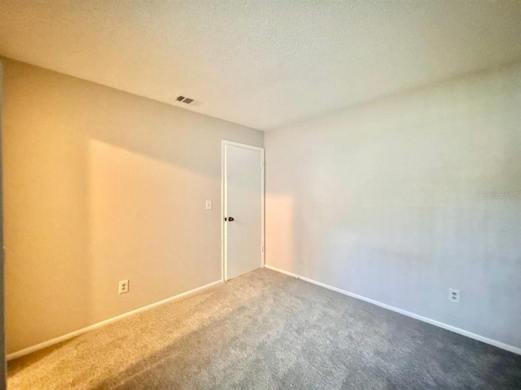 2826 Rampart Circle Clearwater, FL 33761 - Photo 19 of 30 a view of an empty room