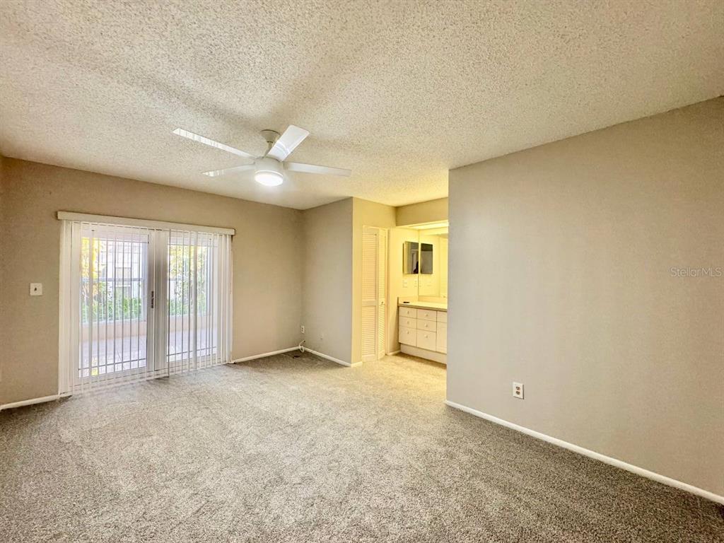 2826 Rampart Circle Clearwater, FL 33761 - Photo 20 of 30 an empty room with a empty space and windows