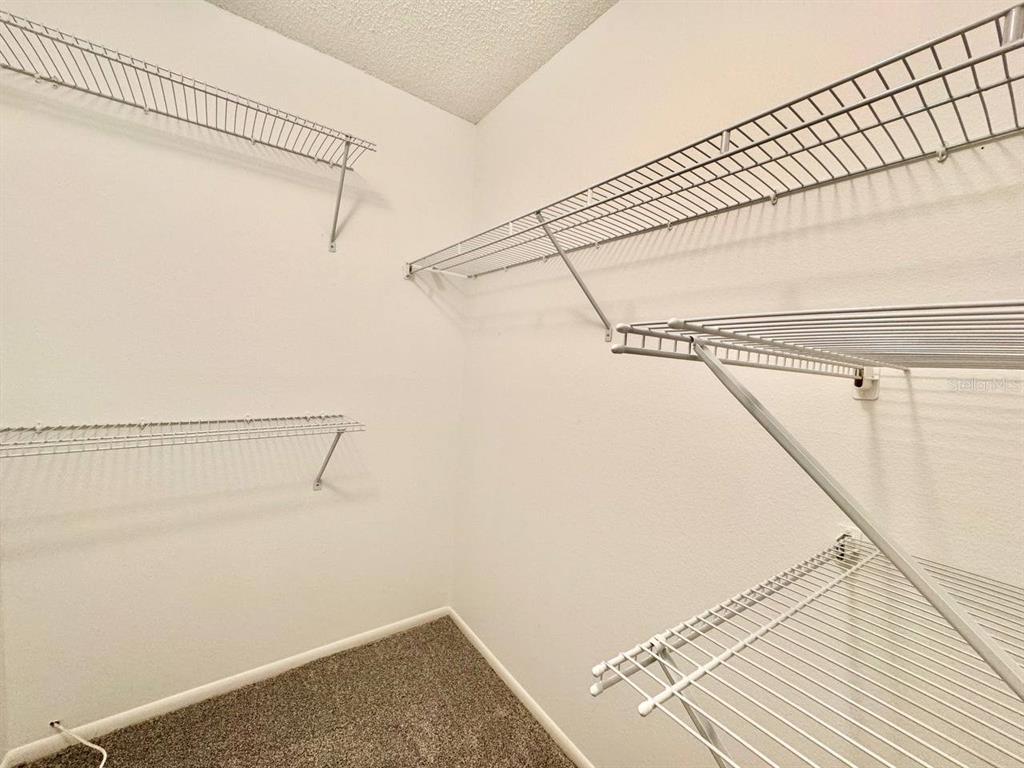 2826 Rampart Circle Clearwater, FL 33761 - Photo 26 of 30 a view of a room with racks on the wall