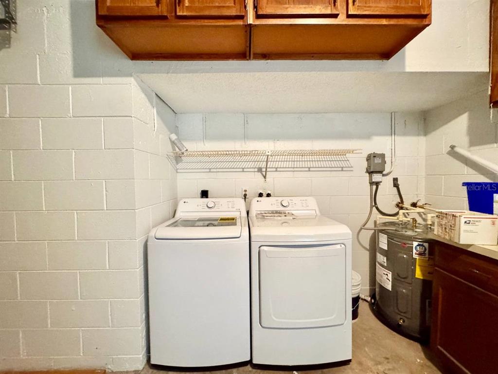 2826 Rampart Circle Clearwater, FL 33761 - Photo 28 of 30 a utility room with dryer and washer