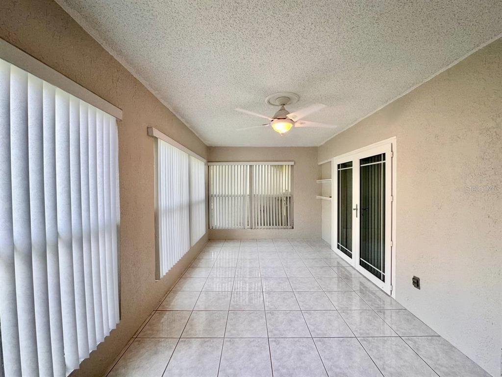 2826 Rampart Circle Clearwater, FL 33761 - Photo 6 of 30 a view of an empty room with window