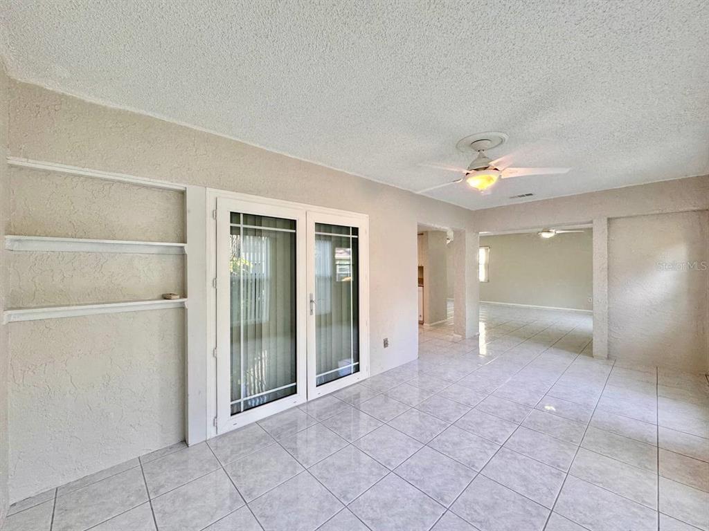 2826 Rampart Circle Clearwater, FL 33761 - Photo 8 of 30 an empty room with a empty space and windows