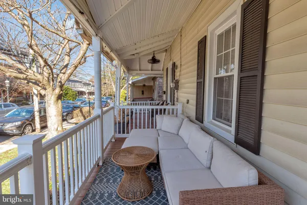 a view of balcony with furniture