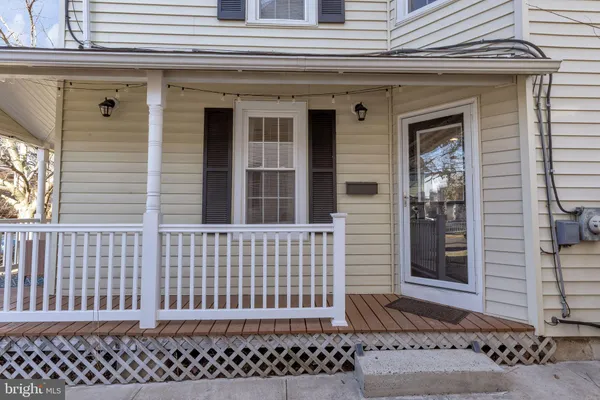 a view of a brick house with a large window