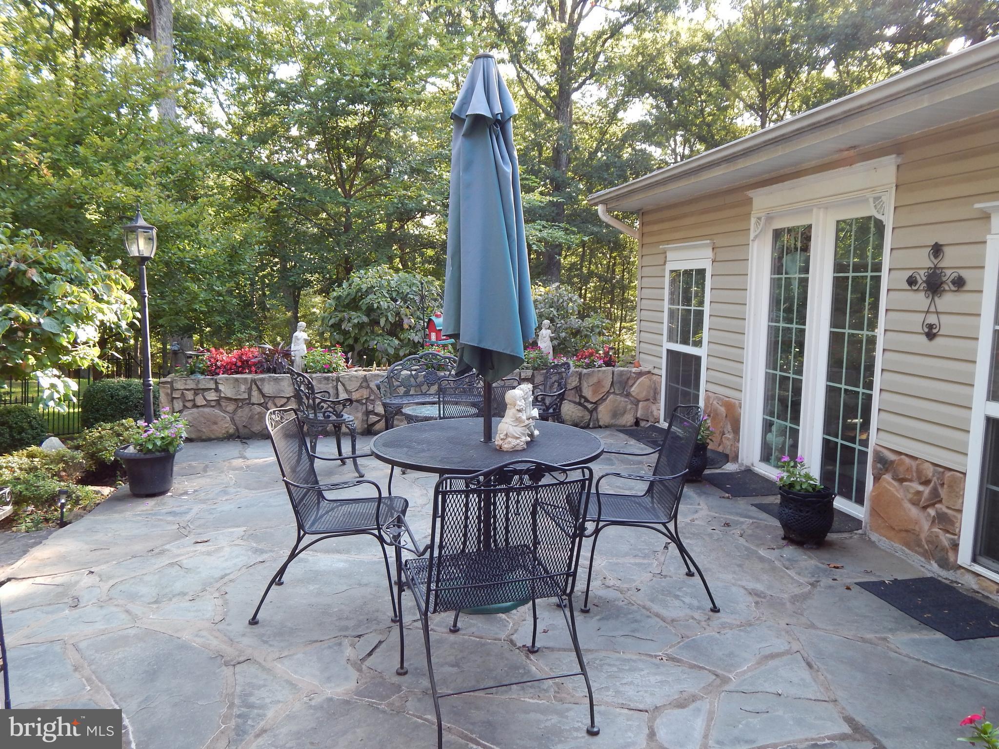 1090 Co Rte 9/8 Berkeley Springs, WV 25411 - Photo 13 of 30 Stone Patio