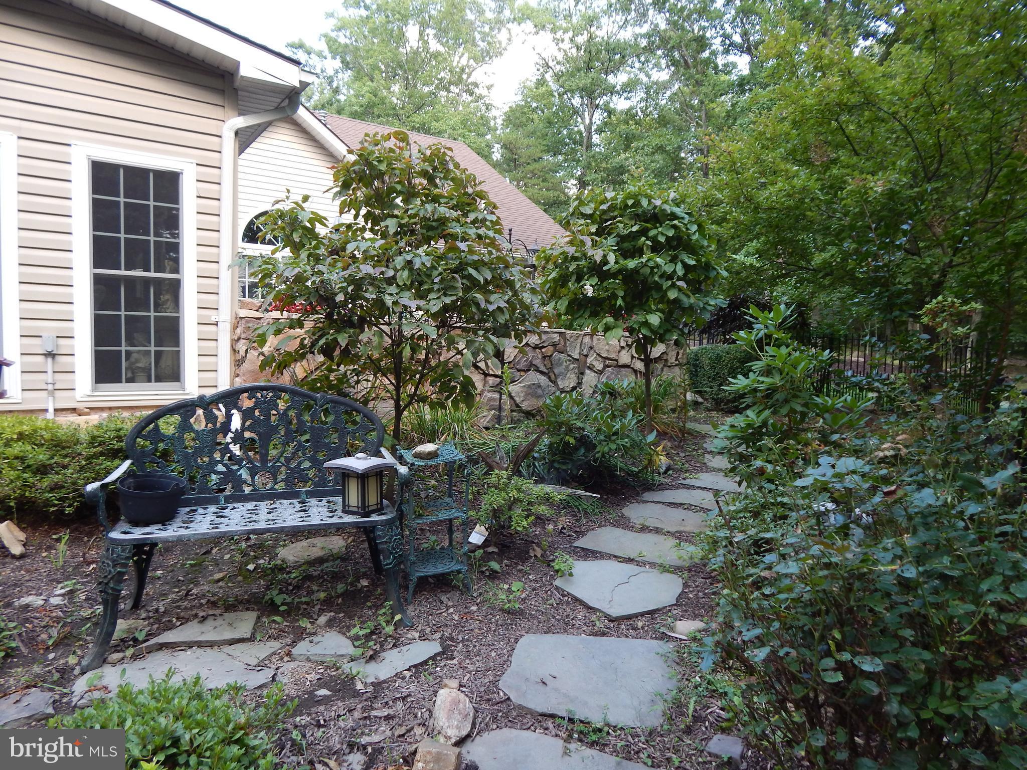 1090 Co Rte 9/8 Berkeley Springs, WV 25411 - Photo 17 of 30 Path in back of the house