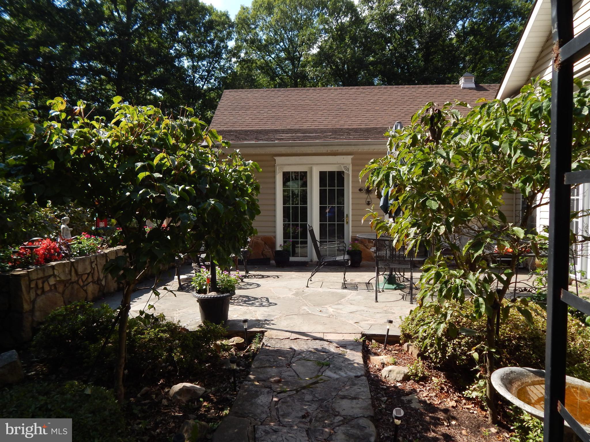 1090 Co Rte 9/8 Berkeley Springs, WV 25411 - Photo 20 of 30 Stone Patio
