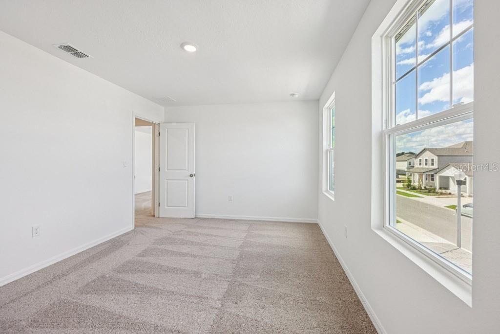 30121 Misty Pnes Road Mount Dora, FL 32757 - Photo 48 of 55 a view of an empty room with a window