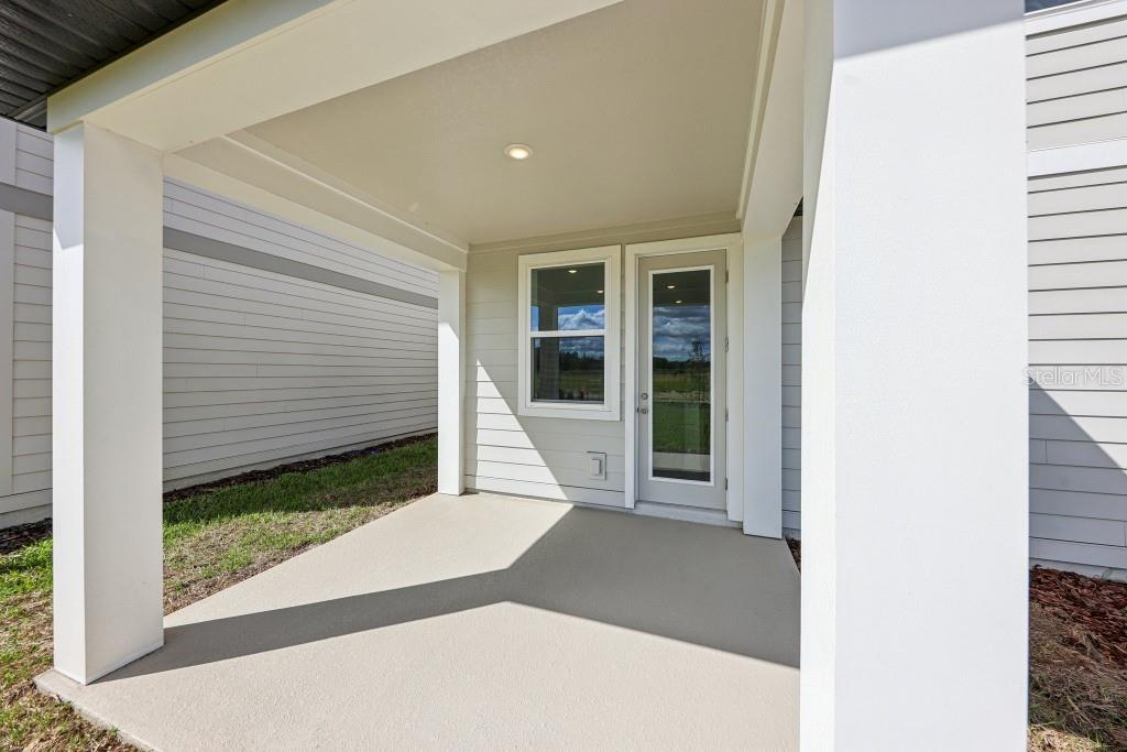 30121 Misty Pnes Road Mount Dora, FL 32757 - Photo 53 of 55 a view of a back yard of the house