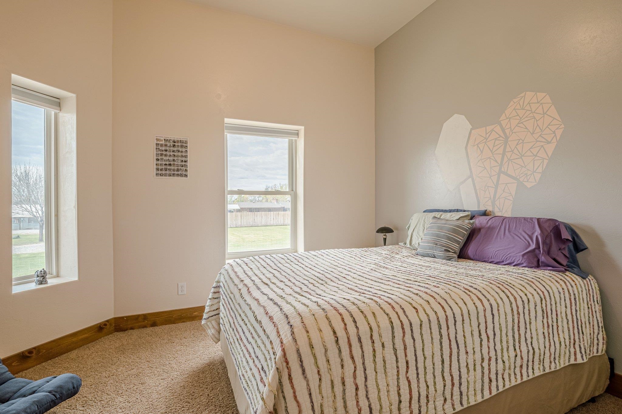 3652 1/2 G 7/10 Road Palisade, CO 81526 - Photo 13 of 42 a bedroom with a bed and a window