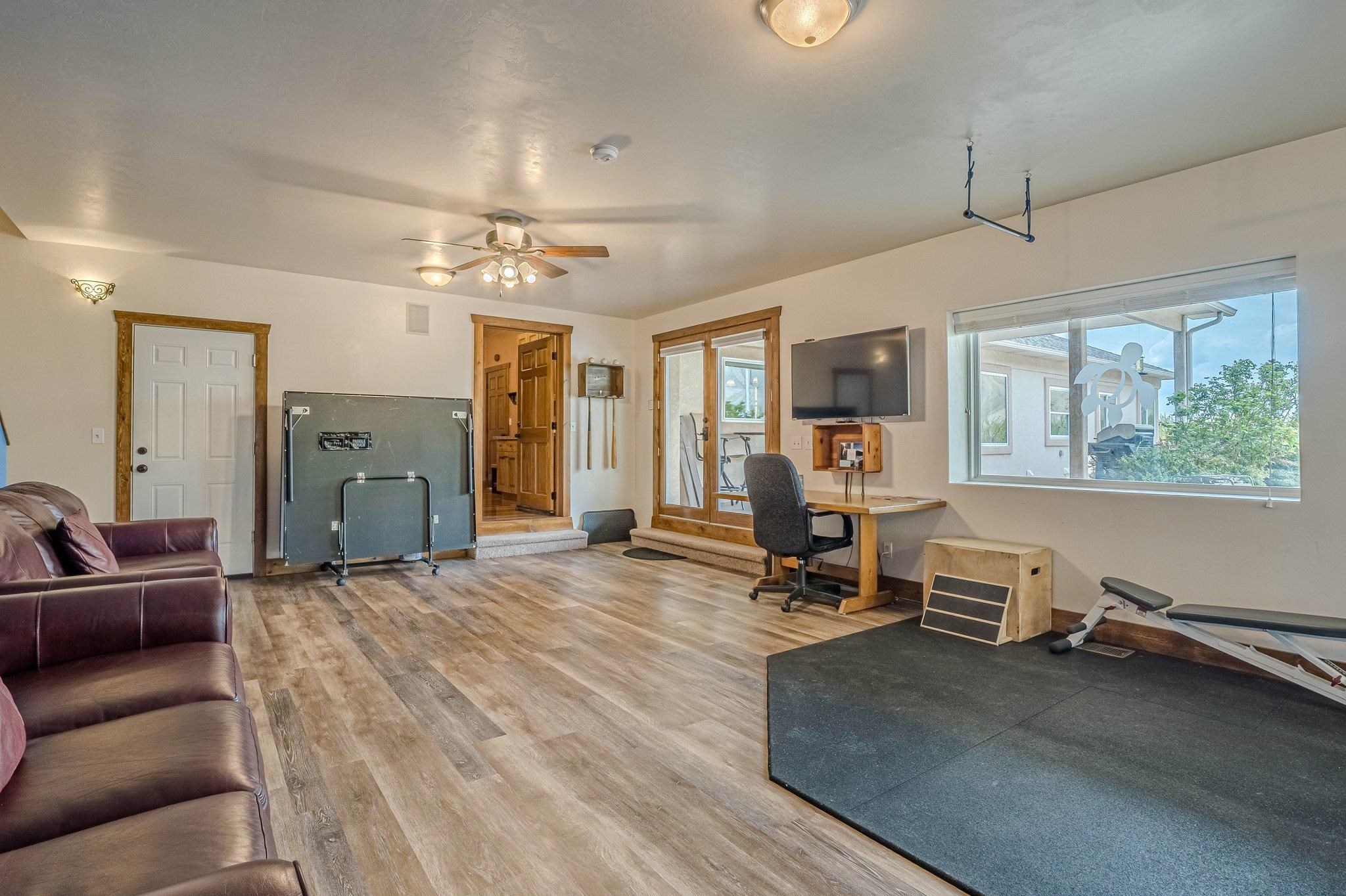3652 1/2 G 7/10 Road Palisade, CO 81526 - Photo 32 of 42 a view of a livingroom with workspace and a window