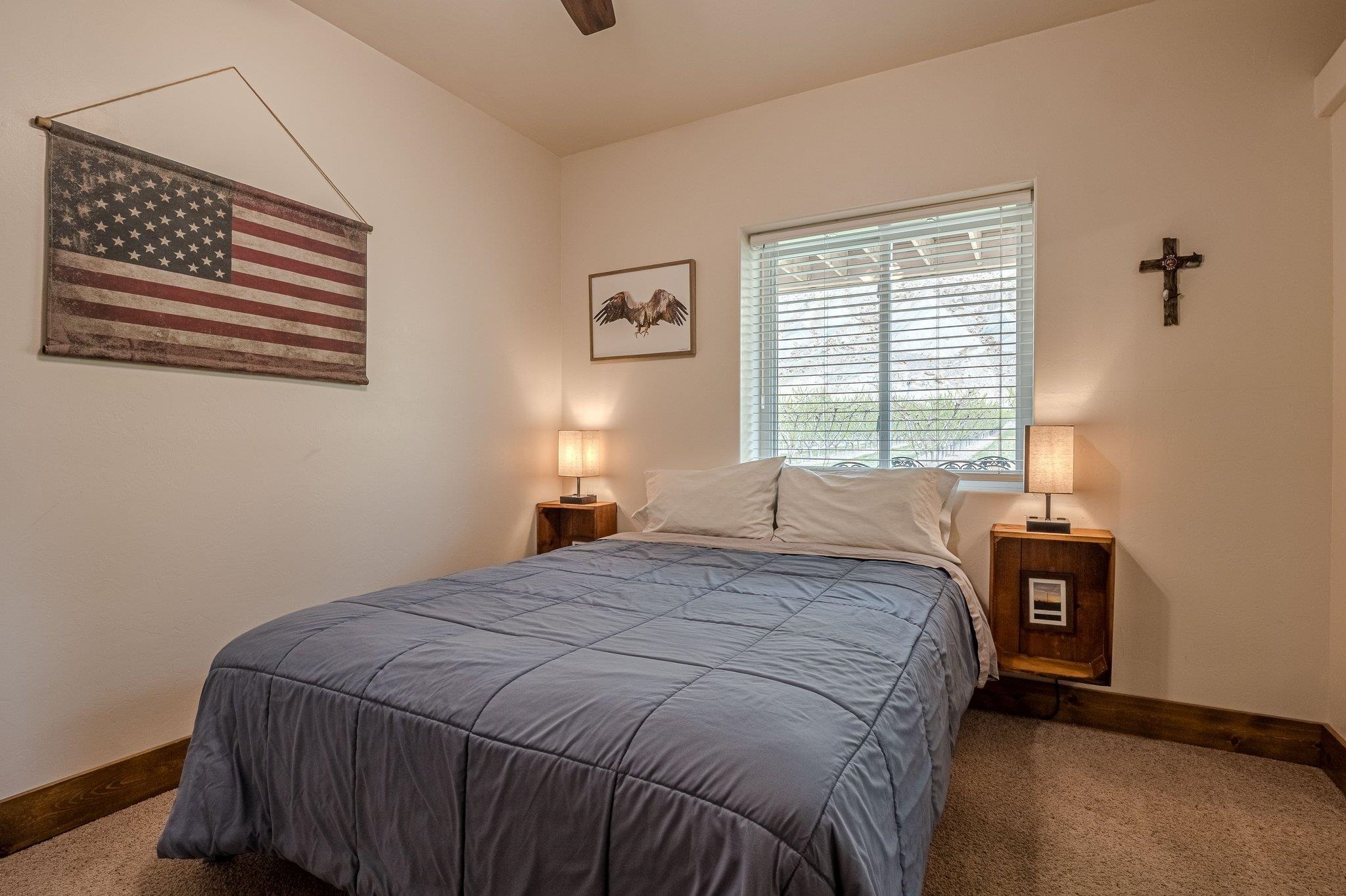 3652 1/2 G 7/10 Road Palisade, CO 81526 - Photo 33 of 42 a bedroom with a bed and a window