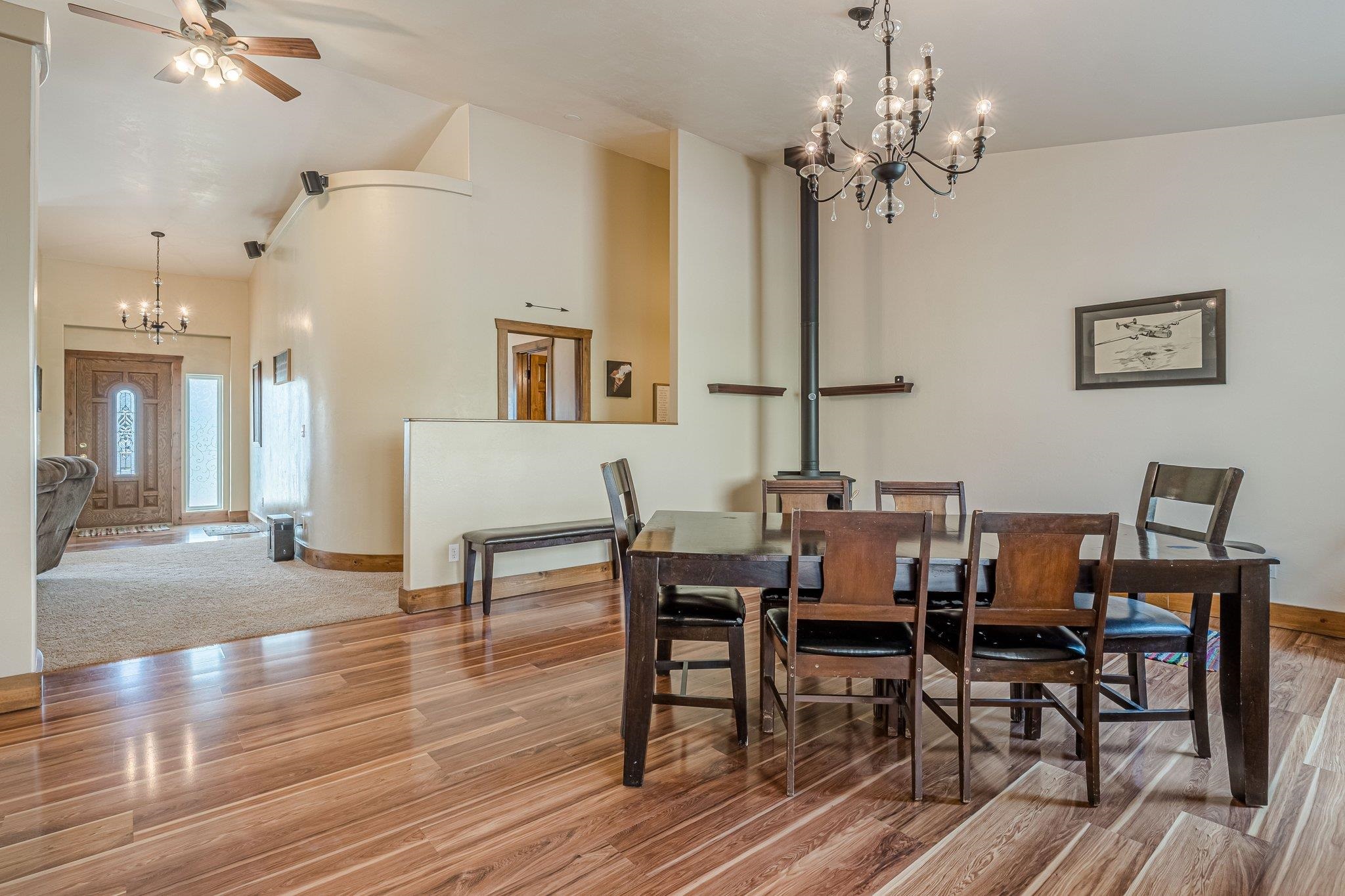 3652 1/2 G 7/10 Road Palisade, CO 81526 - Photo 8 of 42 a view of a dining room with furniture and chandelier