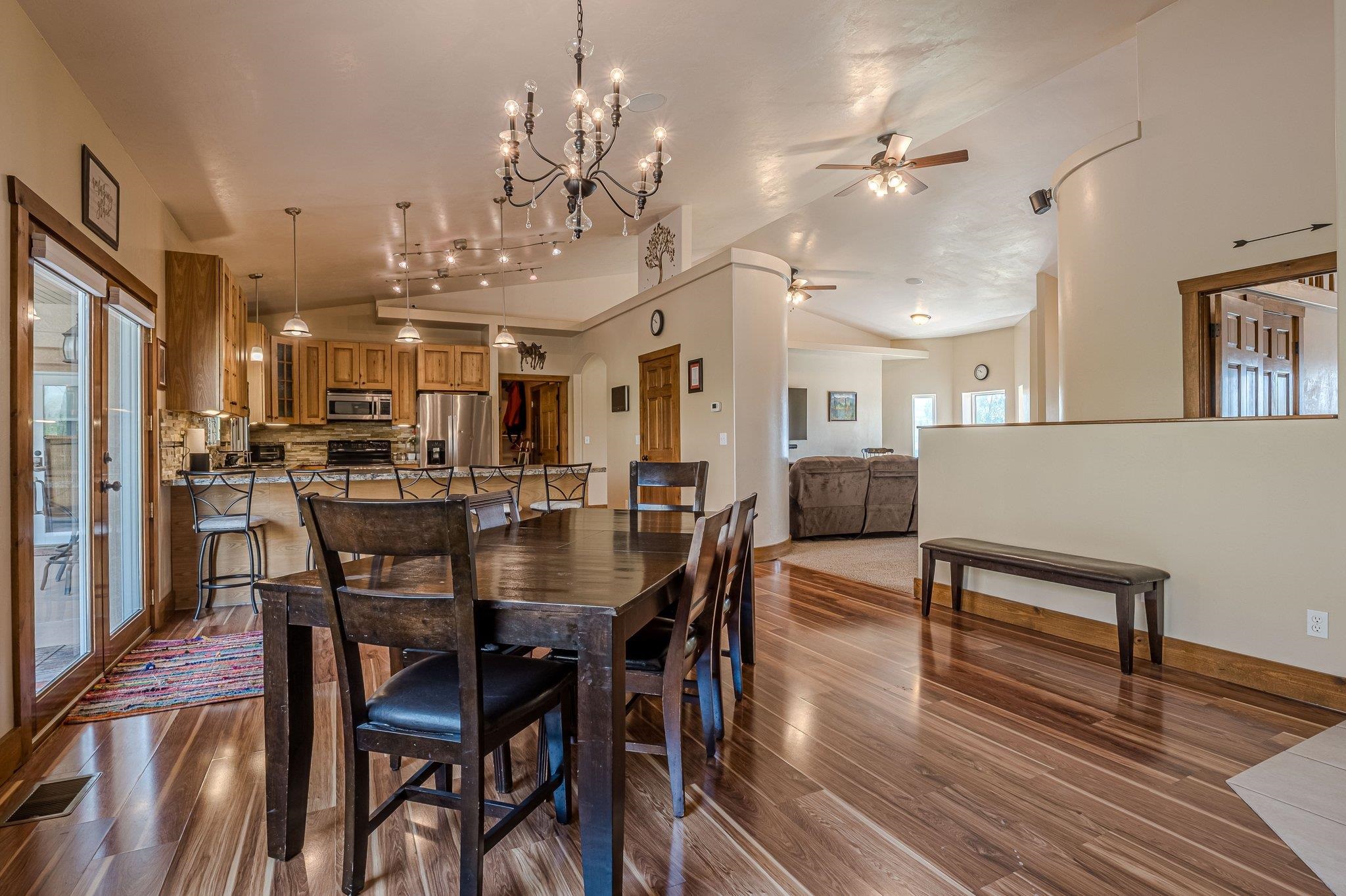 3652 1/2 G 7/10 Road Palisade, CO 81526 - Photo 9 of 42 a view of a dining room with furniture and wooden floor