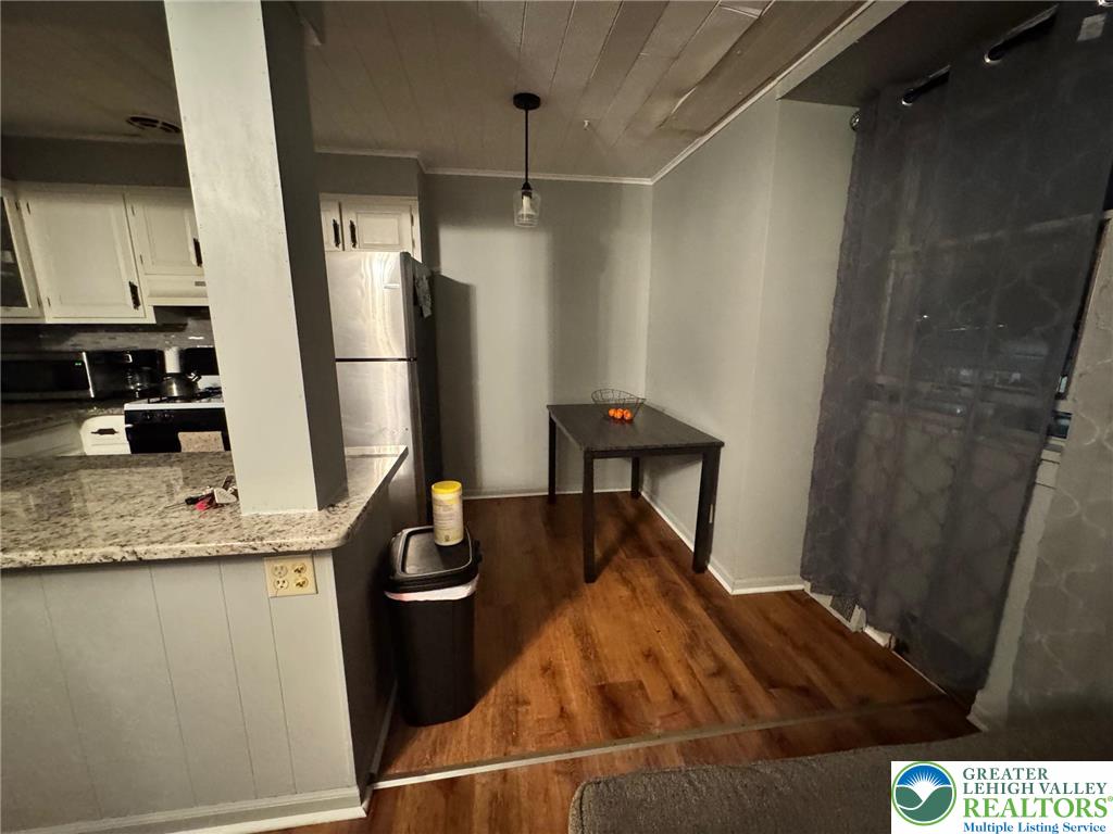 2336 3rd Street Wilson, PA 18042 - Photo 14 of 29 a kitchen with a sink and a refrigerator