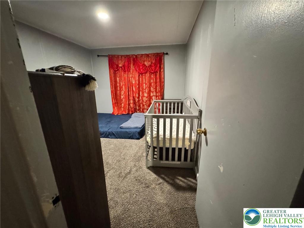 2336 3rd Street Wilson, PA 18042 - Photo 20 of 29 a view of a porch with a door and chair