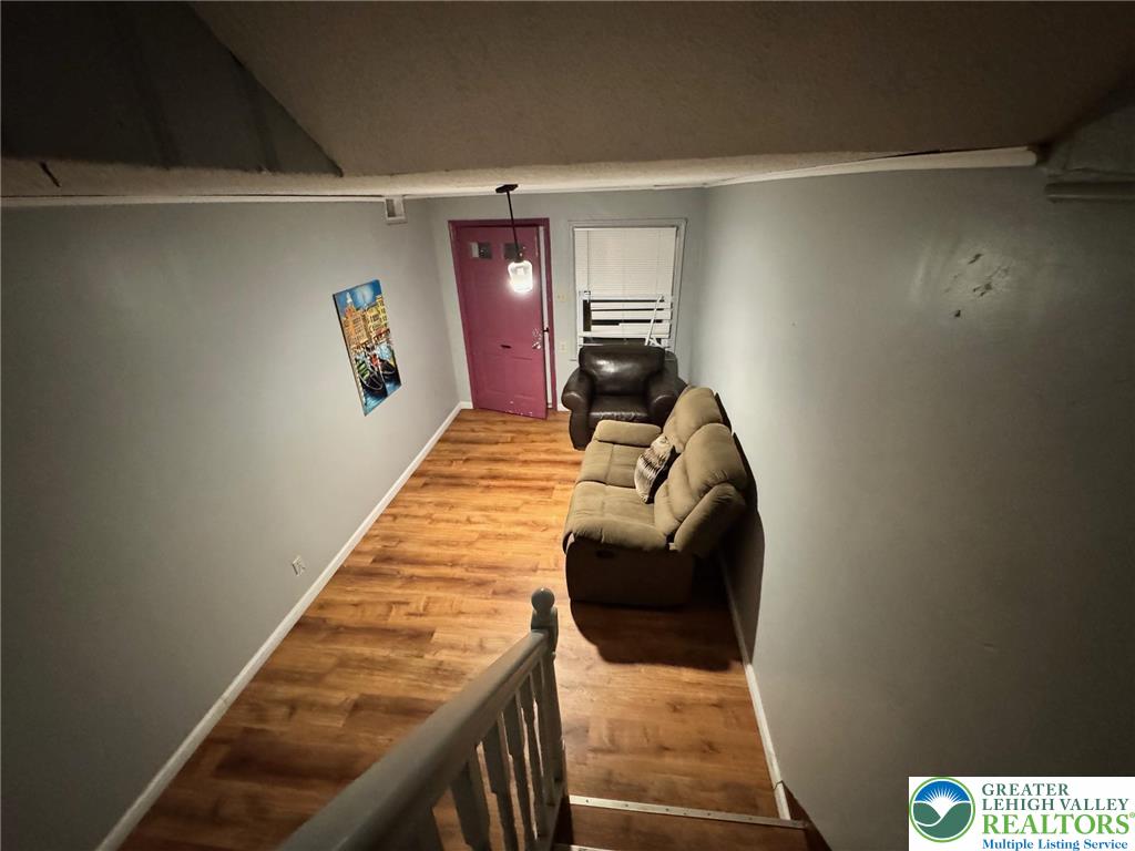 2336 3rd Street Wilson, PA 18042 - Photo 2 of 29 a bedroom with a bed and lamp