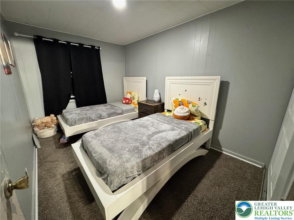 2336 3rd Street Wilson, PA 18042 - Photo 26 of 29 a bedroom with bed and walk in closet