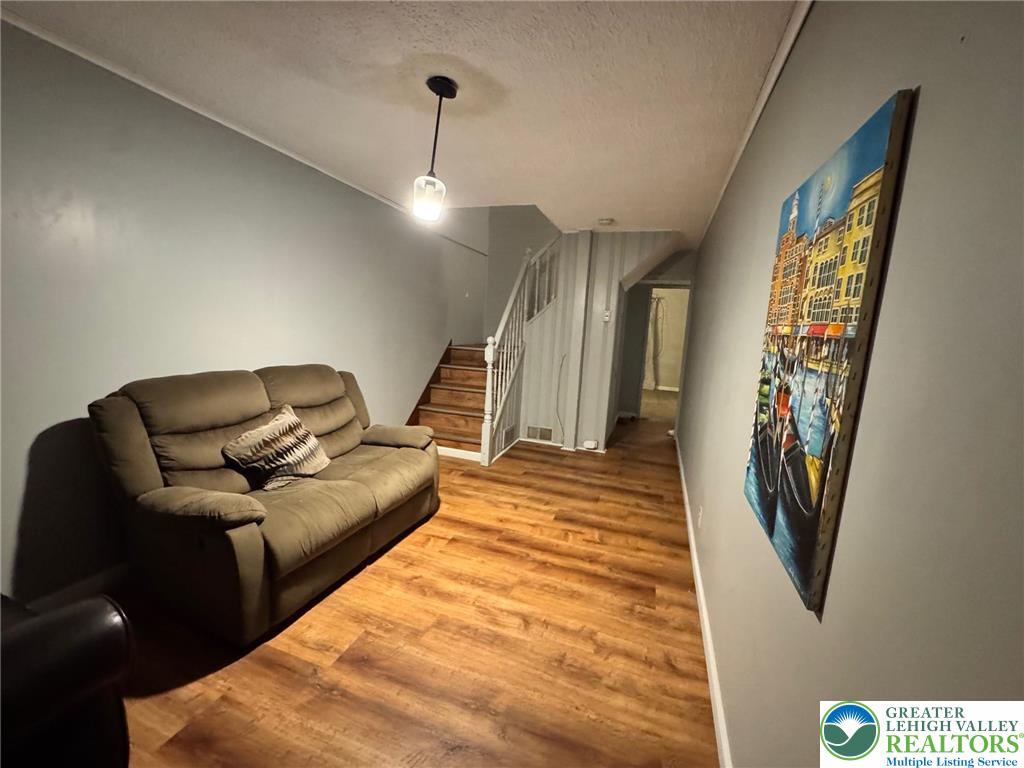 2336 3rd Street Wilson, PA 18042 - Photo 27 of 29 a living room with furniture and a ceiling fan