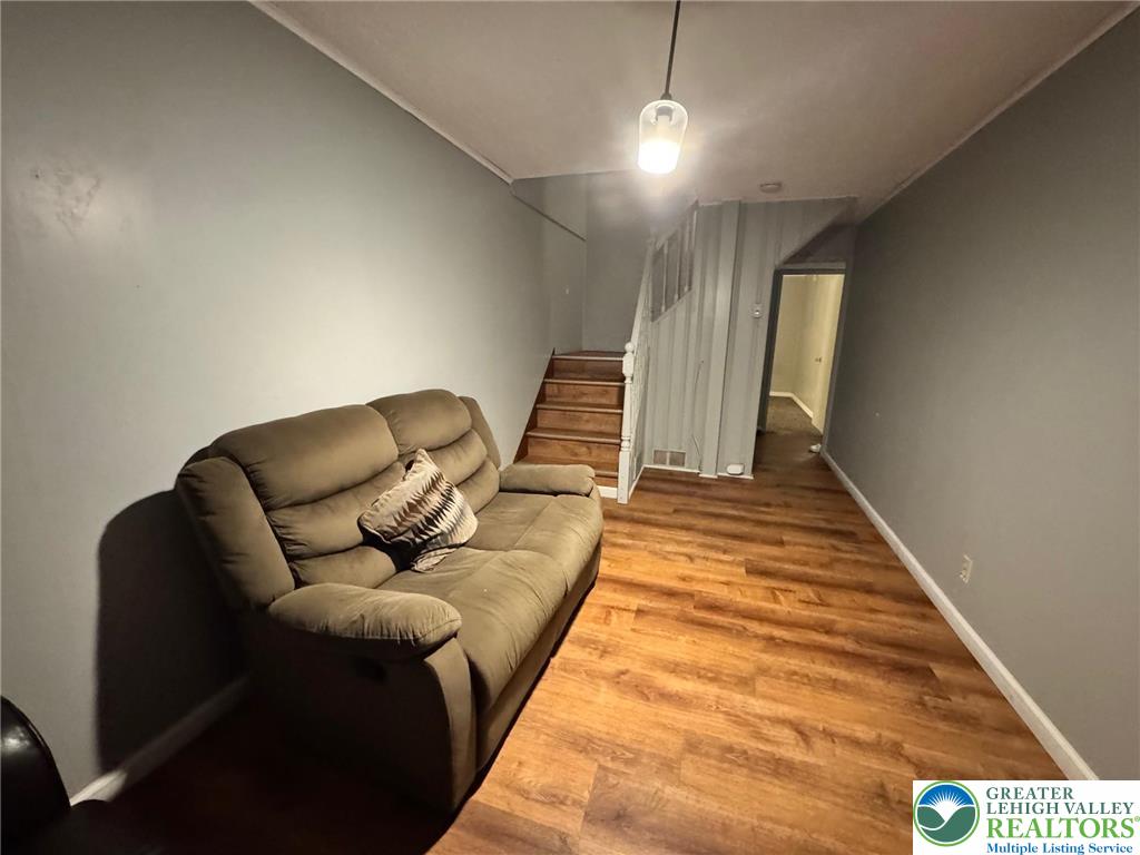 2336 3rd Street Wilson, PA 18042 - Photo 28 of 29 a living room with a couch and a rug