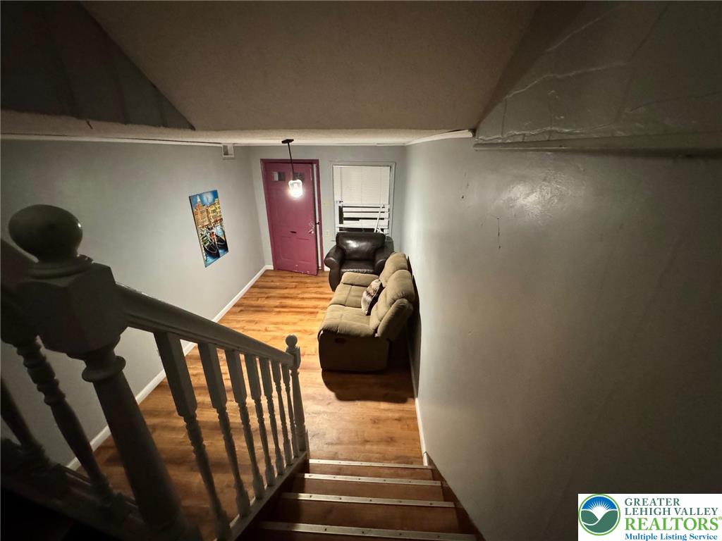 2336 3rd Street Wilson, PA 18042 - Photo 3 of 29 a bedroom with a bed and wooden floor