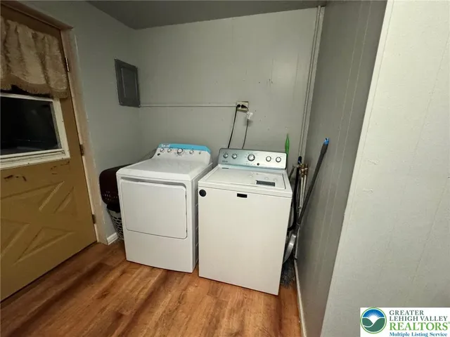 a white toilet sitting next to a sink