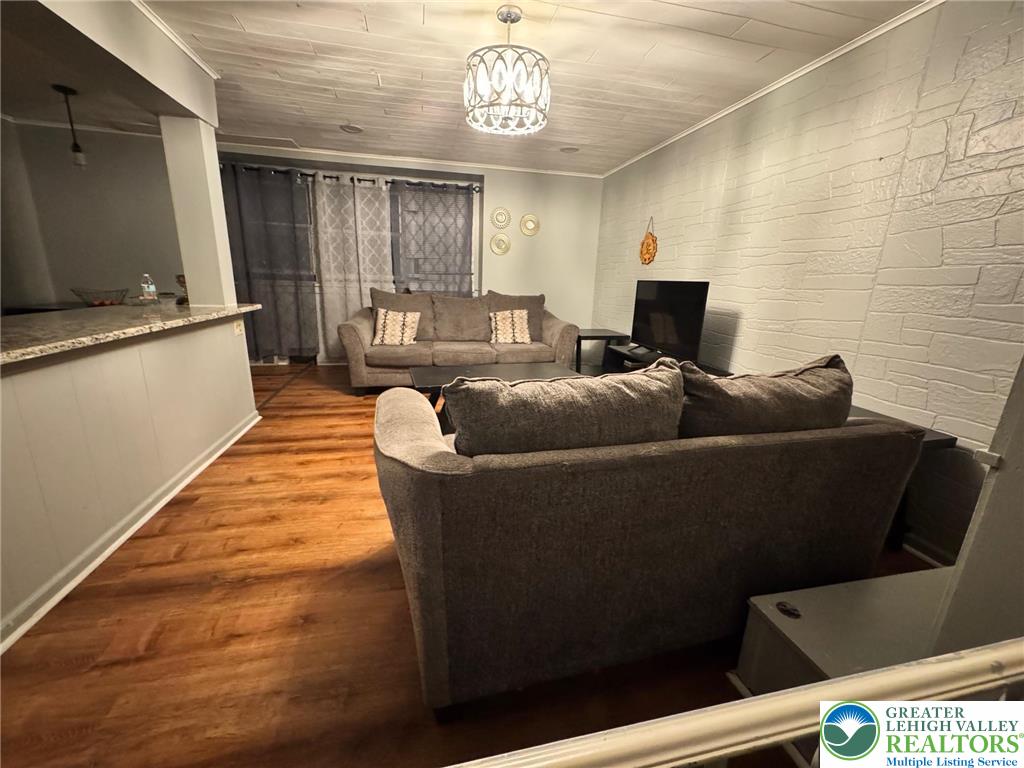 2336 3rd Street Wilson, PA 18042 - Photo 9 of 29 a living room with furniture and a window