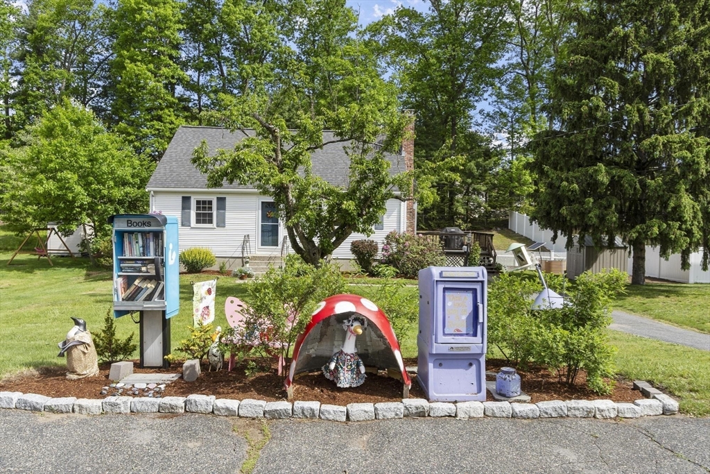6 Edith Road Hudson, MA 01749 - Photo 30 of 30 a front view of a house with garden