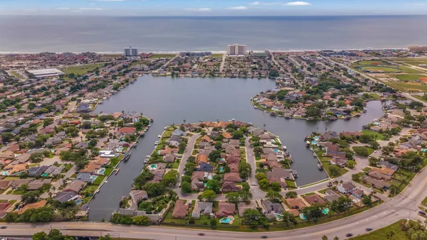 a view of a city with an ocean view