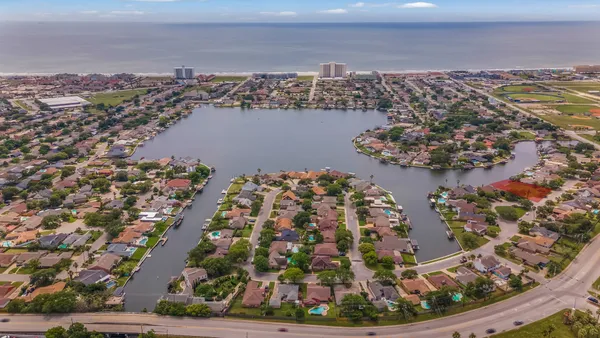 a view of a city with an ocean