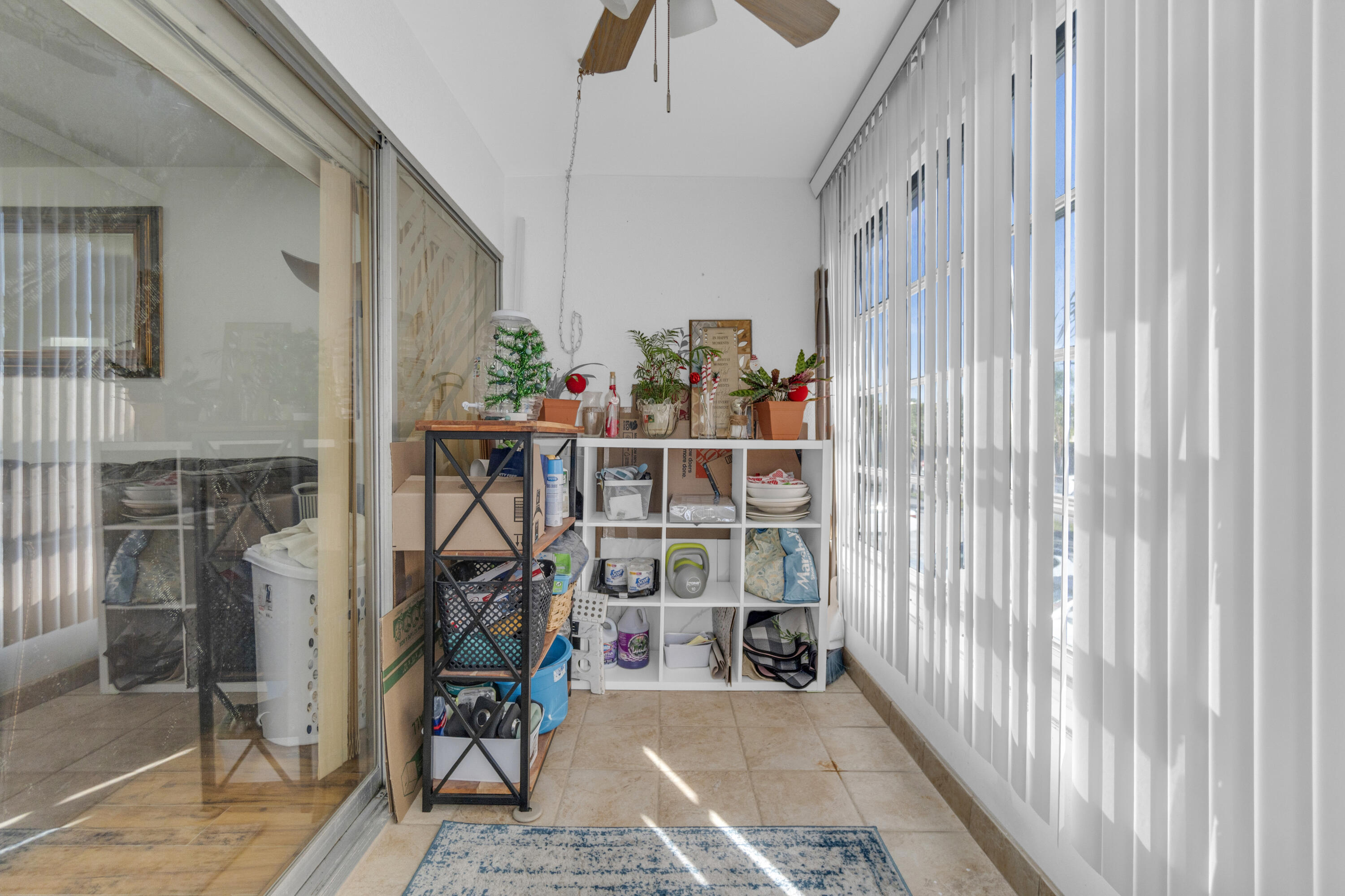 504 Davis Road, Unit 86 Palm Springs, FL 33461 - Photo 10 of 25 a view of a hallway with wooden floor and entryway