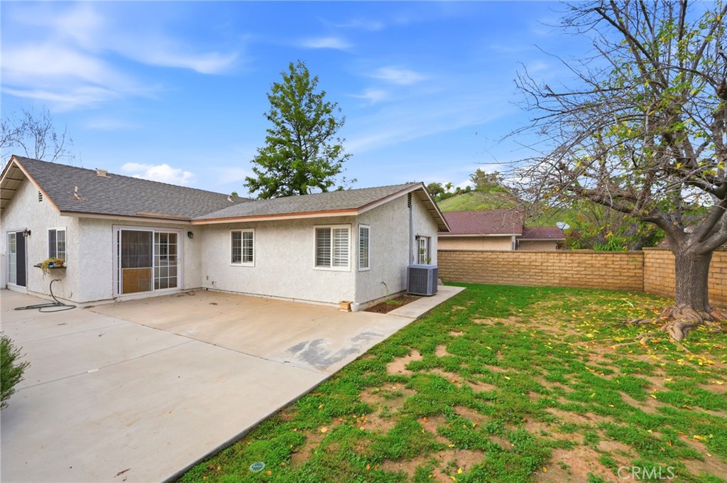 25868 Alegro Drive Valencia, CA 91355 - Photo 27 of 35 a view of a house with yard and a tree