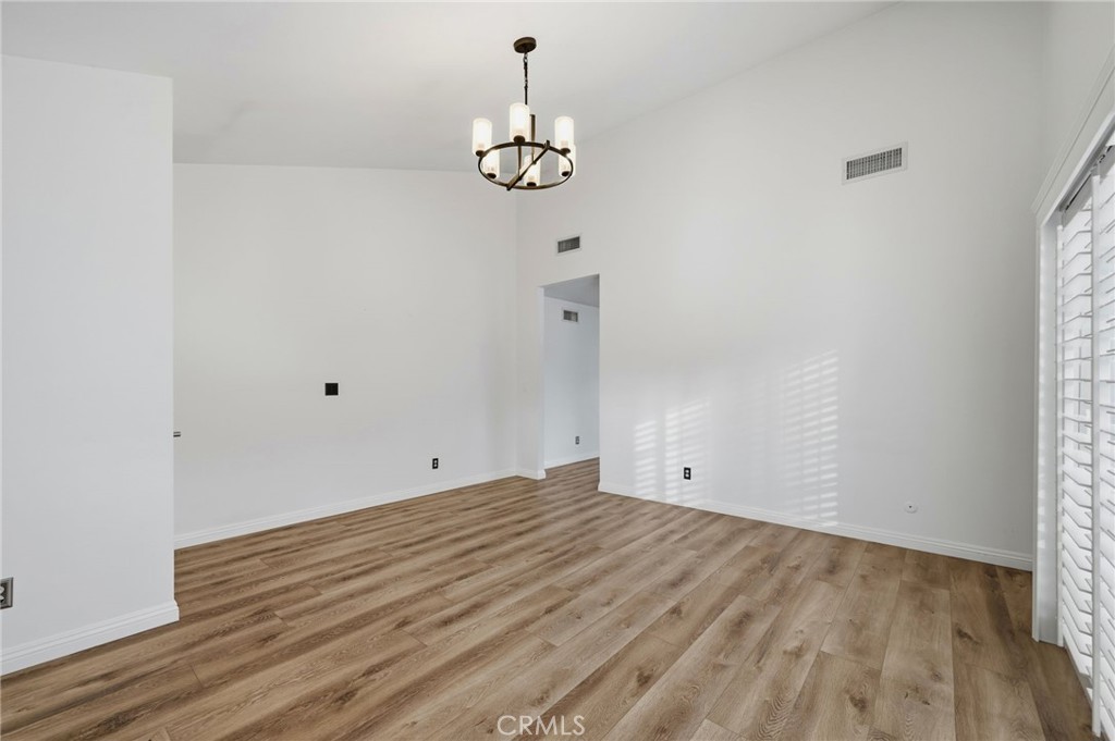 25868 Alegro Drive Valencia, CA 91355 - Photo 5 of 35 a view of empty room with wooden floor