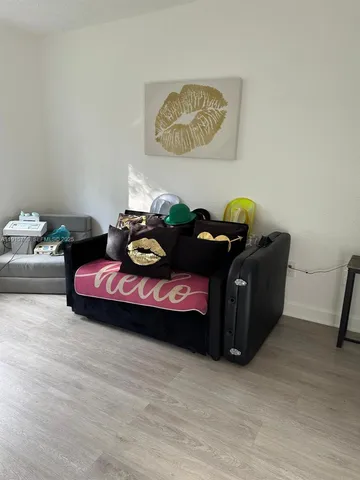 a bedroom with a bed and toys