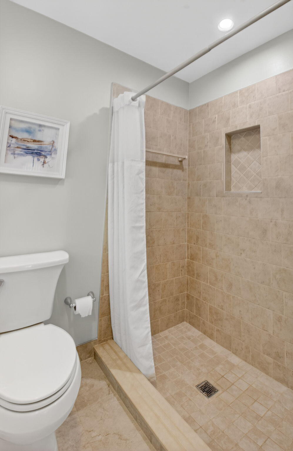 1390 High Point Way Southwest, Unit D Delray Beach, FL 33445 - Photo 13 of 39 a bathroom with a shower and a toilet