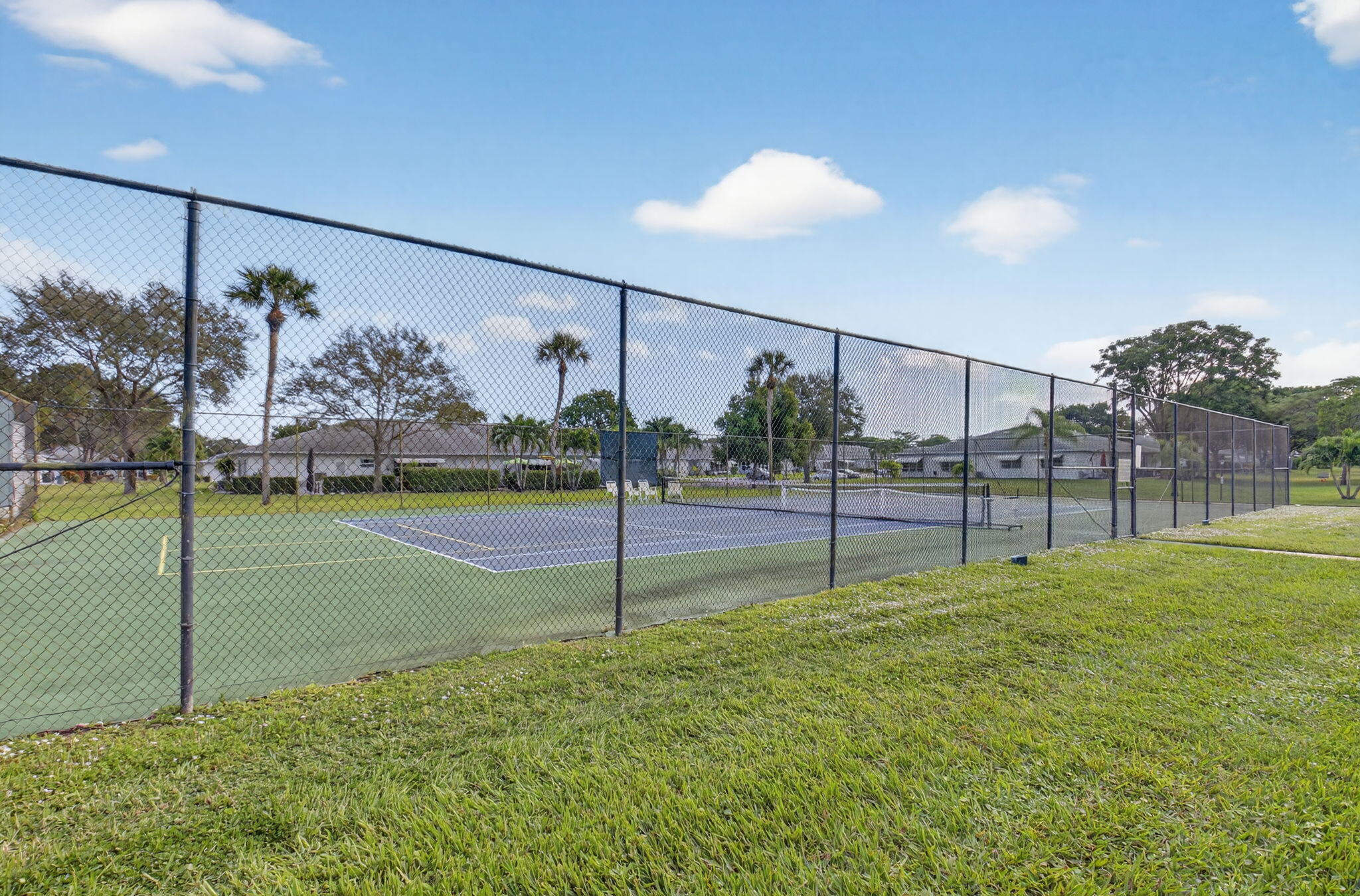 1390 High Point Way Southwest, Unit D Delray Beach, FL 33445 - Photo 32 of 39 a view of a park