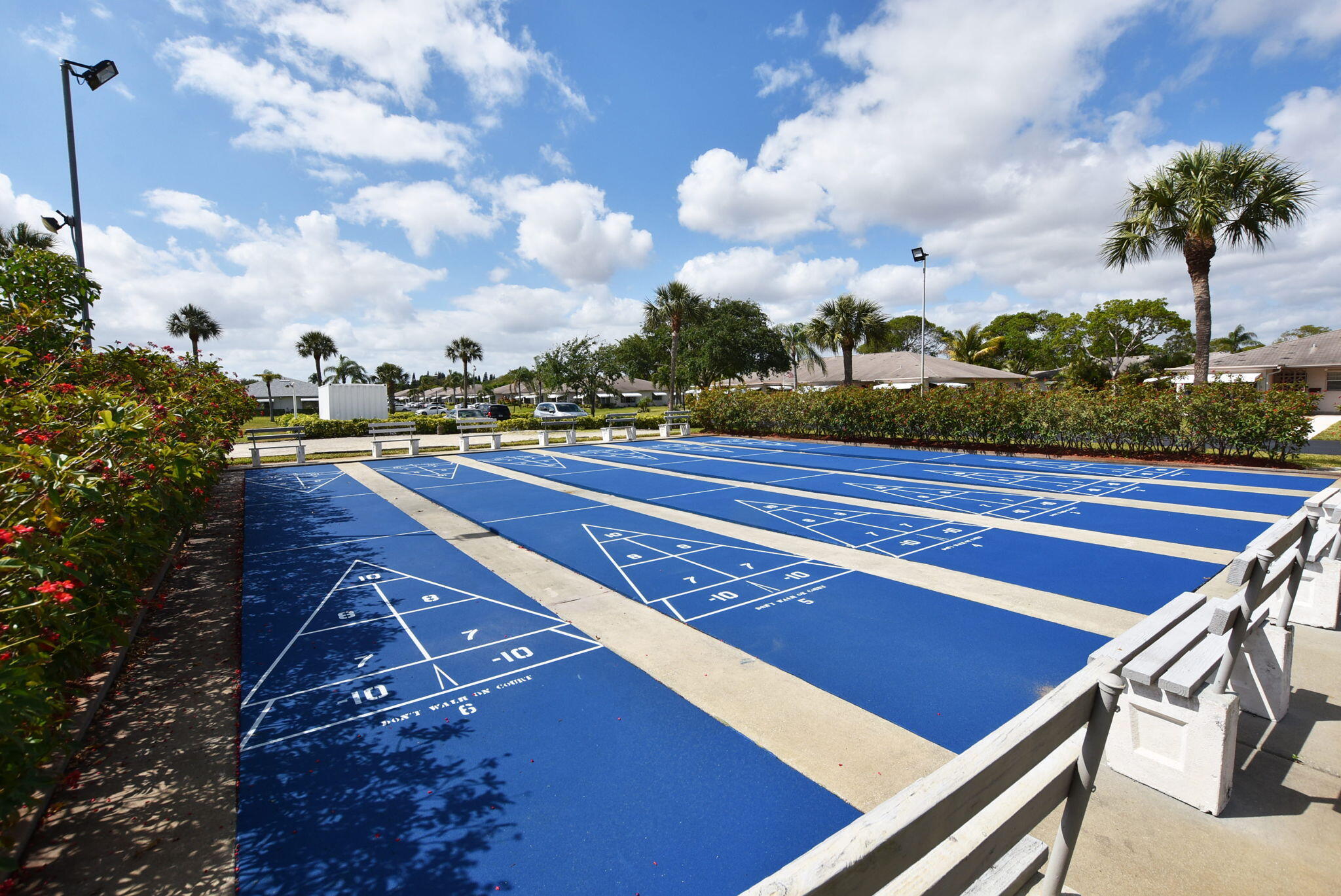 1390 High Point Way Southwest, Unit D Delray Beach, FL 33445 - Photo 39 of 39 a view of a tennis court