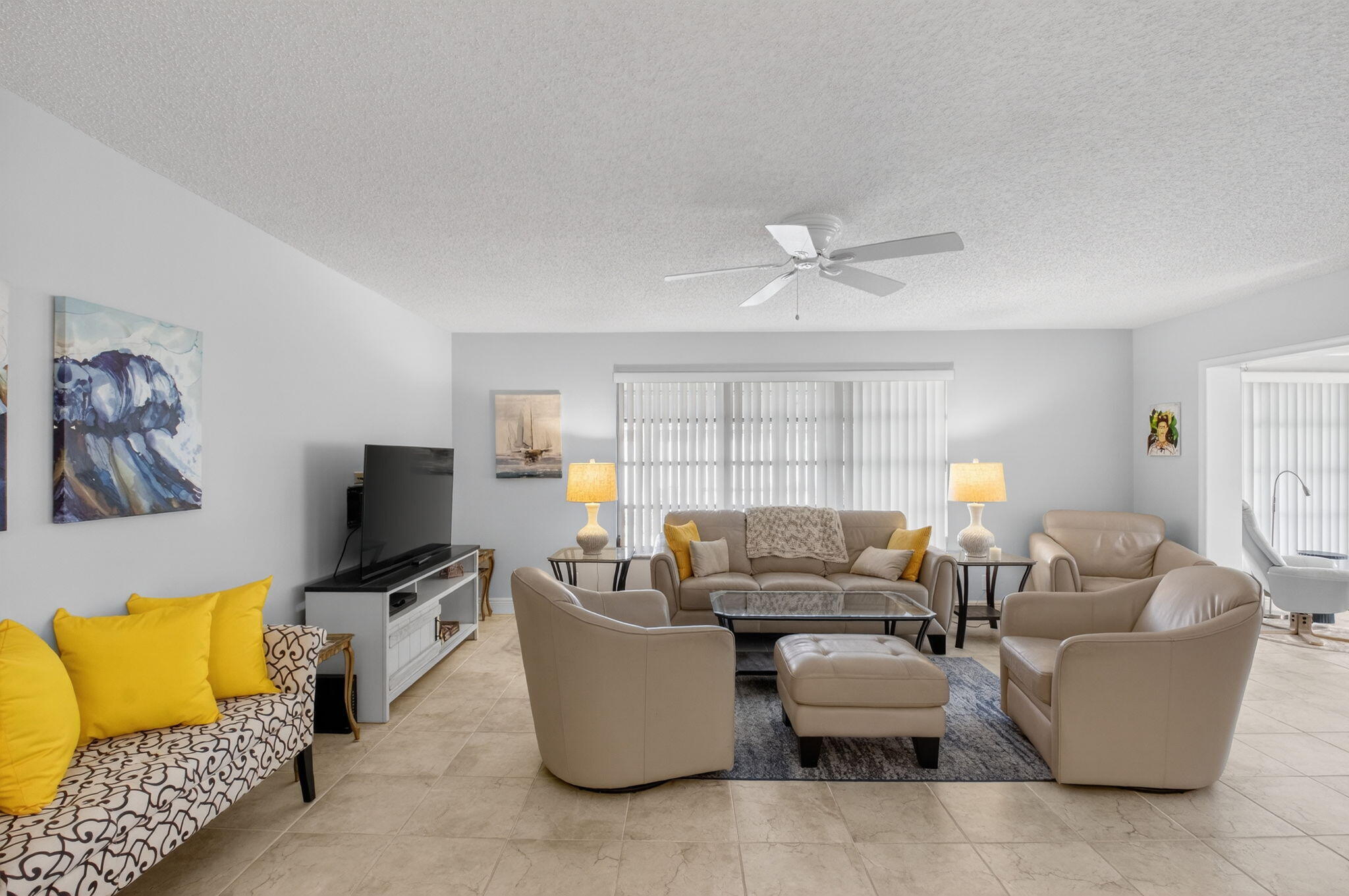 1390 High Point Way Southwest, Unit D Delray Beach, FL 33445 - Photo 5 of 39 a living room with furniture and a flat screen tv