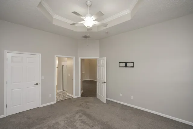 an empty room with a bathroom