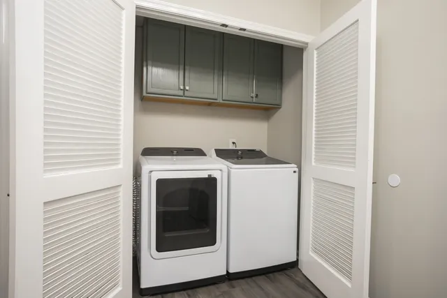 a utility room with dryer and washer