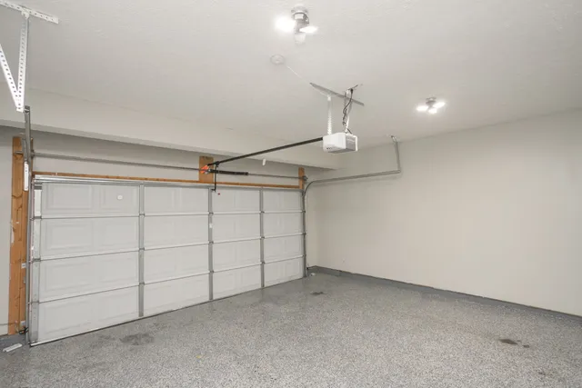 a view of a balcony with wooden floor and fence