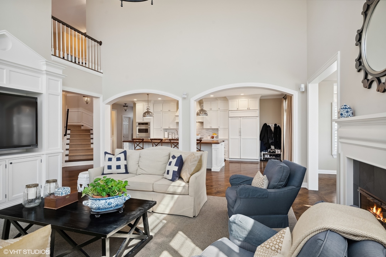 1619 Annapolis Drive Glenview, IL 60026 - Photo 16 of 43 a living room with furniture a flat screen tv and a fireplace